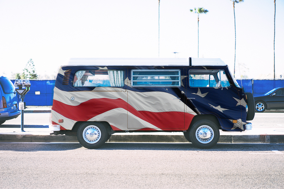 Altered photograph of a VW microbus, made to look as though it has a United States of America flag as its paint job.  This is my attempt at humor, please forgive me.